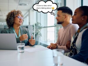 Real estate terms for first-time buyers. Young couple talking with broker